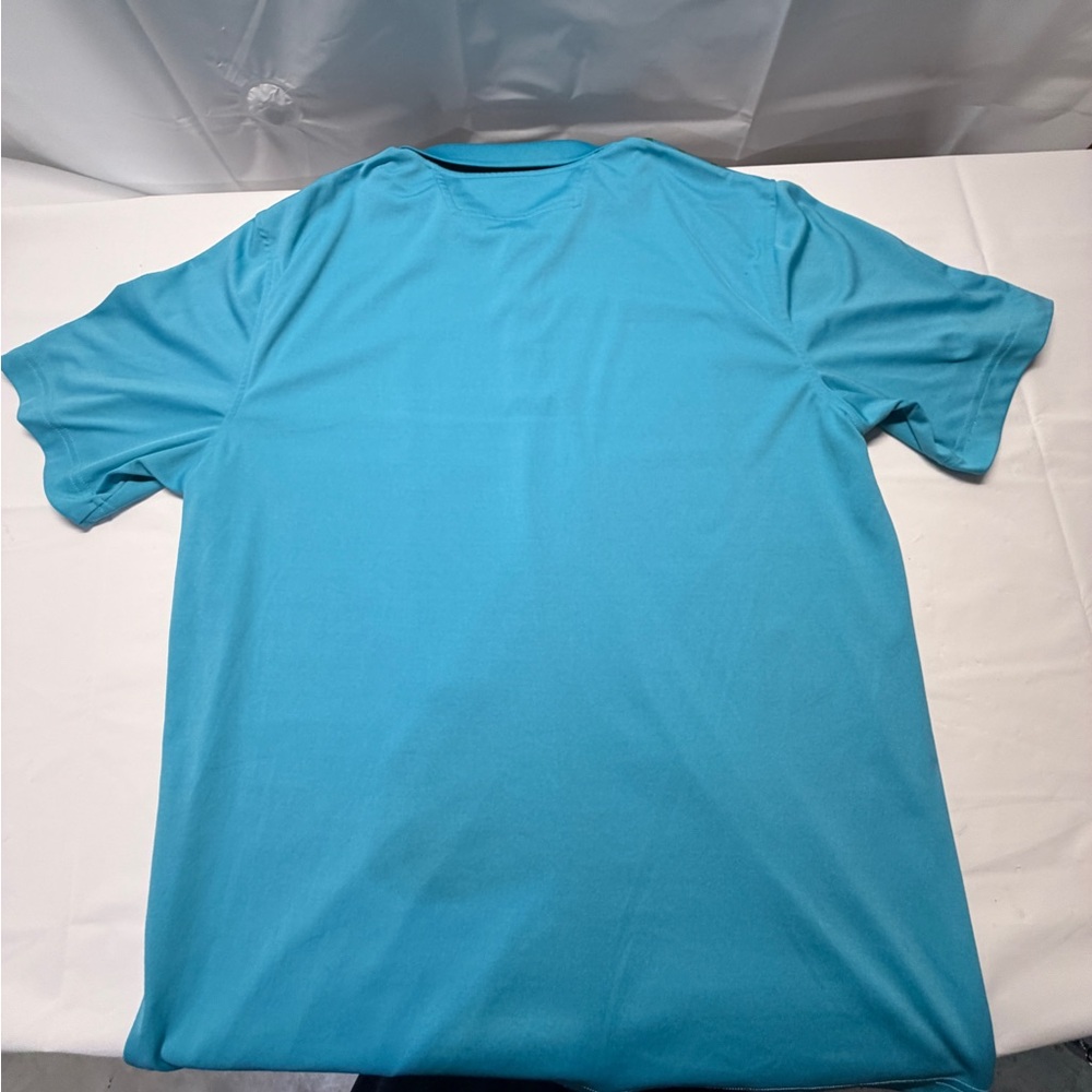 Fila Teal Polo with Green and Yellow Geometric Stripes - Picture 3 of 8